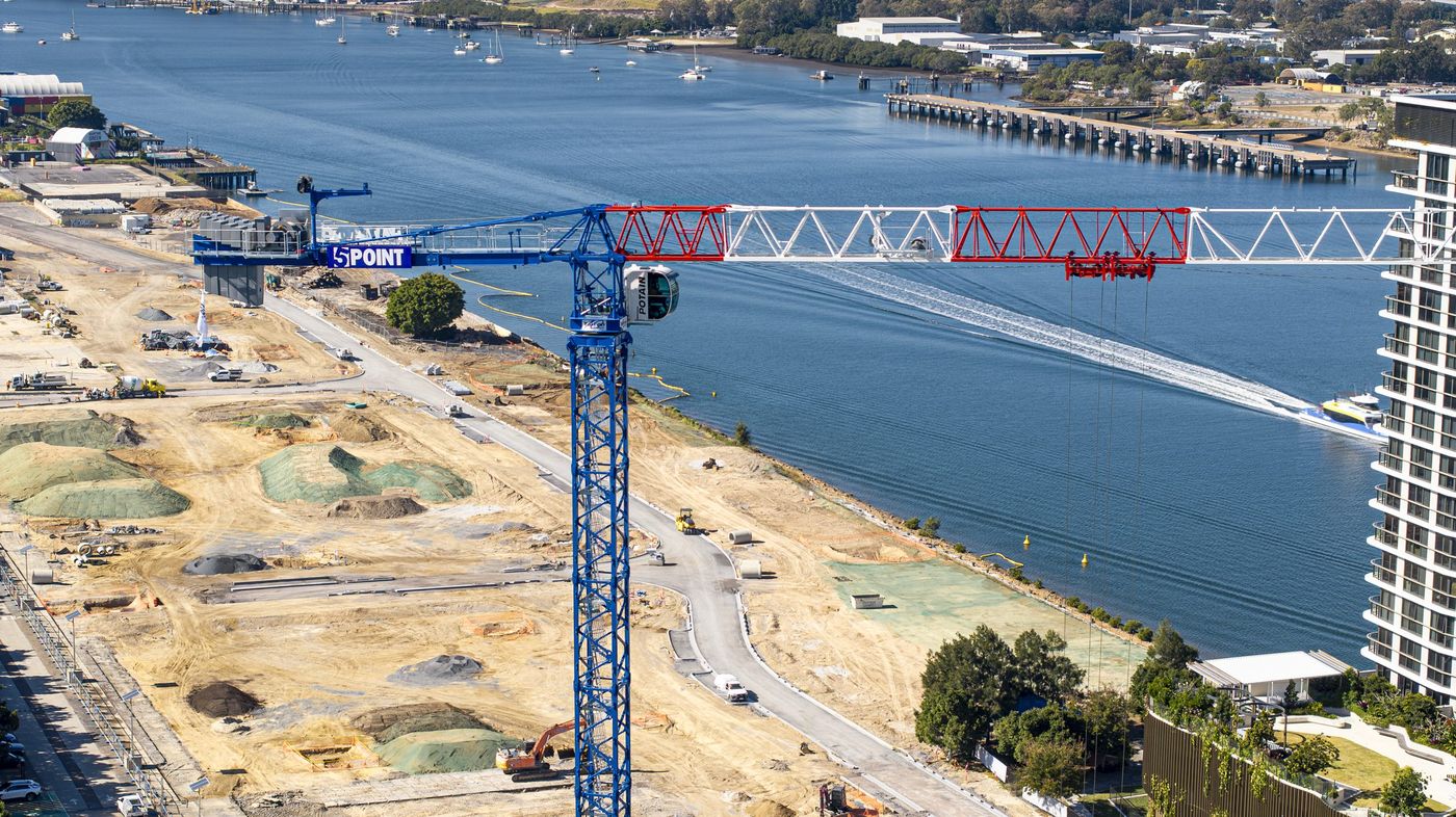 Potain tower crane working over the Brisbane River at Portside, Hamilton