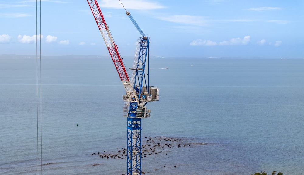 Luffing jib tower crane against the sky at Redcliffe